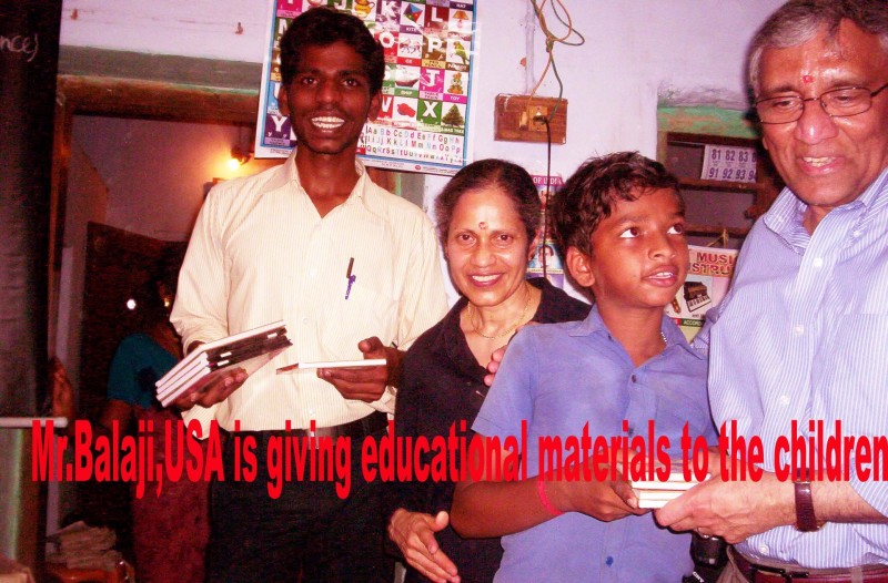 Mr Balaji Giving Educational Materials.jpg